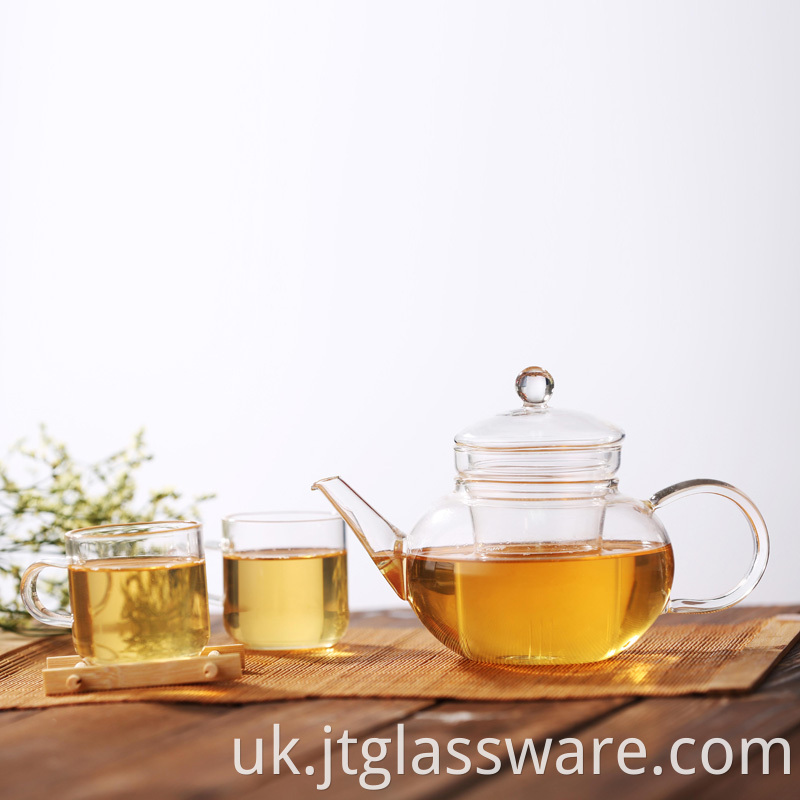 clear teapot and cups